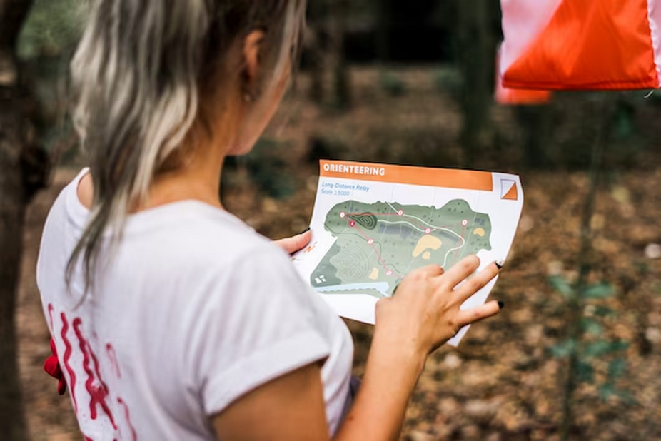 female holding a map